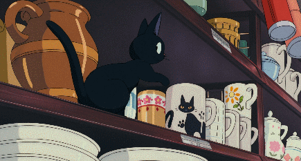 While shopping, Jiji sees a coffee mug with a black cat on it. They just had to buy it!