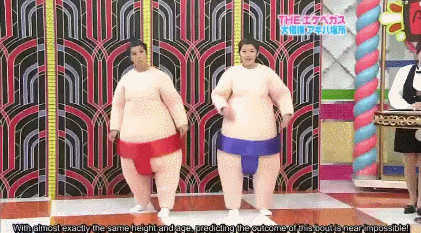 Two girls dancing in sumo outfits. Nuff said!