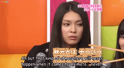 After someone says something nasty to Akimoto, she gets this ugly/evil face.