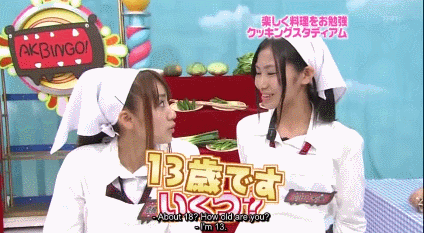 In this episode, the girls had to create certain dishes. After saying something wrong, Takahashi gives this fake smile.